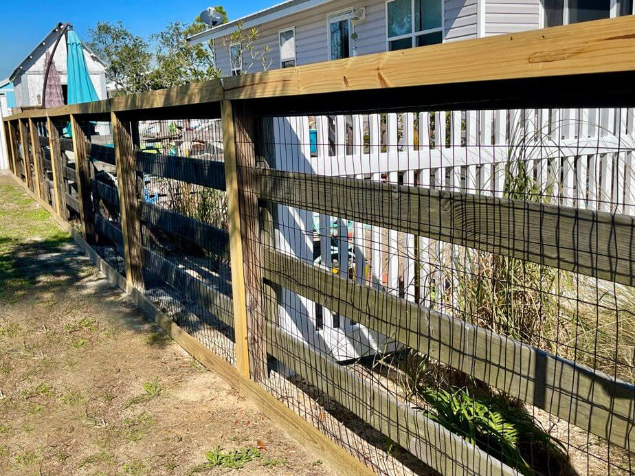 Ranch rail residential wood fencing in the Pensacola, Florida area.