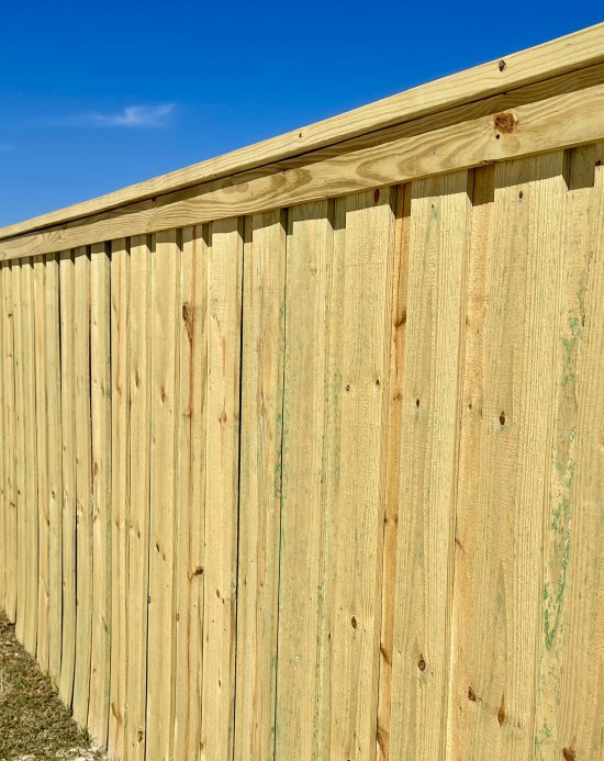 Beautiful example of a Board on Board style wood fence installed in Pensacola, Florida