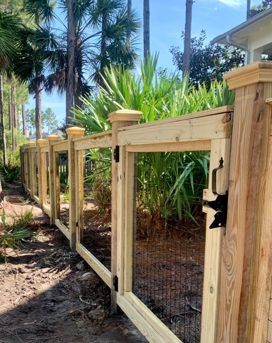 Beautiful example of a Ranch Rail style wood fence installed in Pensacola, Florida